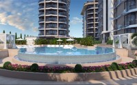 Apartment 1+1 on the 2nd floor in an elite residential complex under construction, in a quiet area of Alanya - Tosmur-id-7359-photo-2