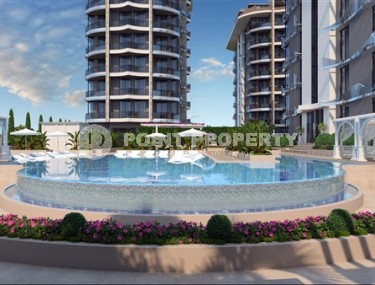 Apartment 1+1 on the 2nd floor in an elite residential complex under construction, in a quiet area of Alanya - Tosmur-id-7359-photo-2