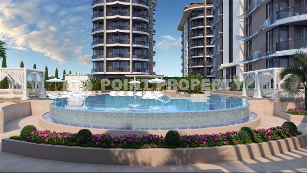 Apartment 1+1 on the 2nd floor in an elite residential complex under construction, in a quiet area of Alanya - Tosmur-id-7359-photo-2