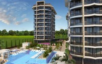 Apartment 1+1 on the 2nd floor in an elite residential complex under construction, in a quiet area of Alanya - Tosmur-id-7359-photo-3