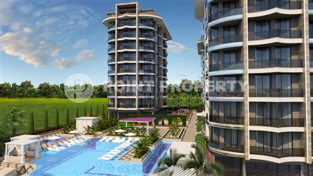 Apartment 1+1 on the 2nd floor in an elite residential complex under construction, in a quiet area of Alanya - Tosmur-id-7359-photo-3