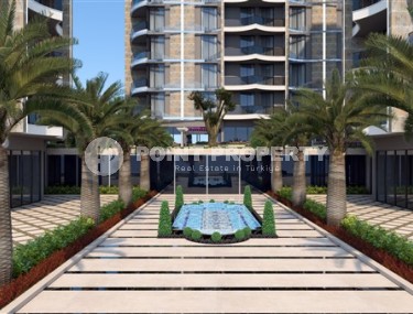 Apartment 1+1 on the 2nd floor in an elite residential complex under construction, in a quiet area of Alanya - Tosmur-id-7359-photo-4