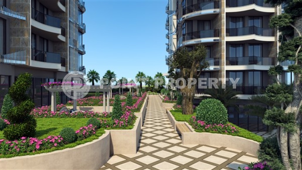 Apartment 1+1 on the 2nd floor in an elite residential complex under construction, in a quiet area of Alanya - Tosmur-id-7359-photo-5