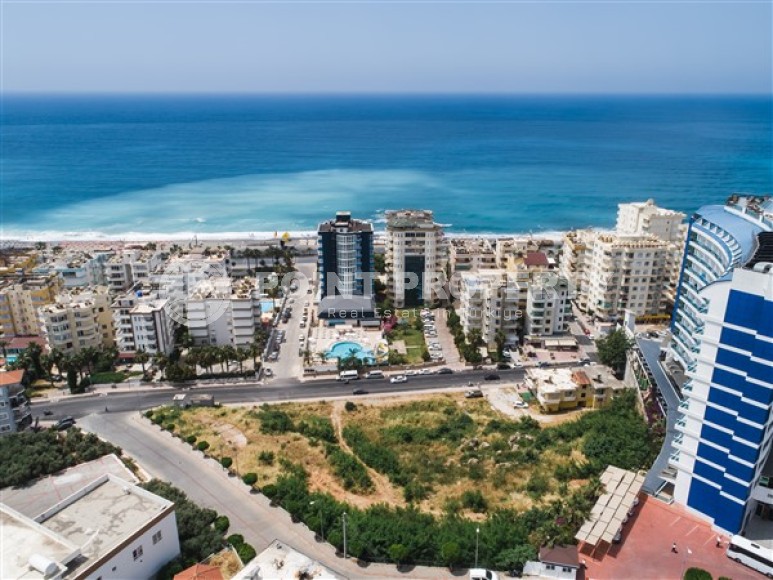 Apartment 1+1 on the 2nd floor in an elite residential complex under construction, in a quiet area of Alanya - Tosmur-id-7359-photo-12