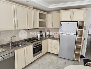 Доступная по цене квартира в 700 метрах от моря, в центре спокойного района Аланьи - Тосмур-id-7366-фото-2