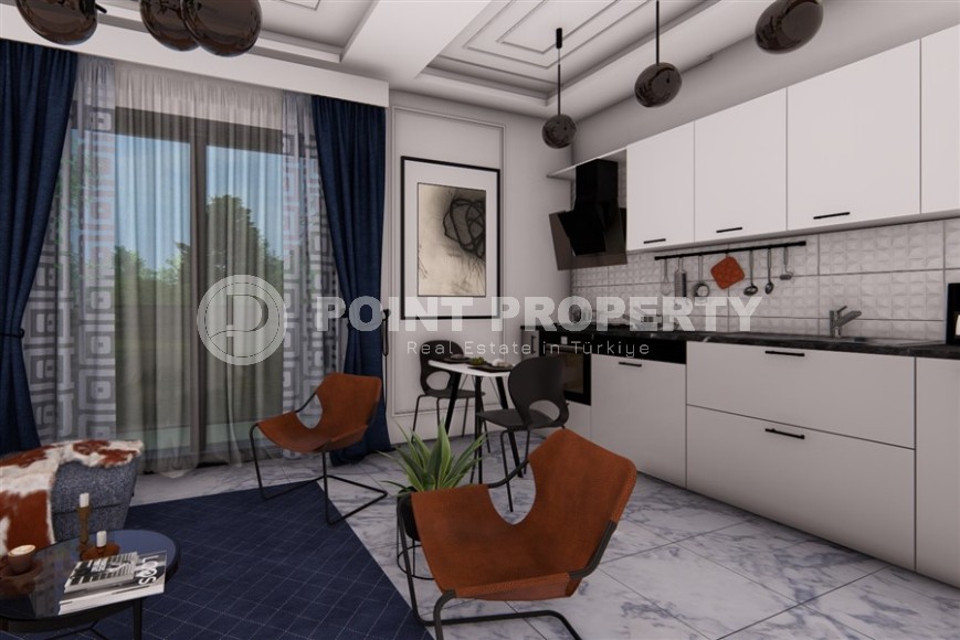 Апартаменты в жилом комплексе на этапе строительства в центре популярного района Анталии - Дешемалты-id-7367-фото-4