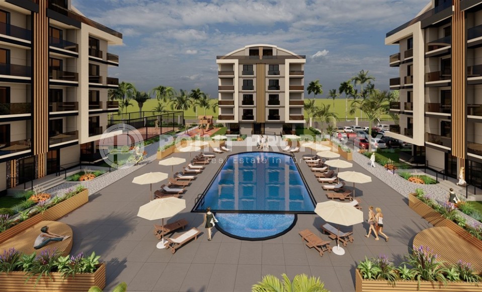 Апартаменты в жилом комплексе на этапе строительства в центре популярного района Анталии - Дешемалты-id-7367-фото-7