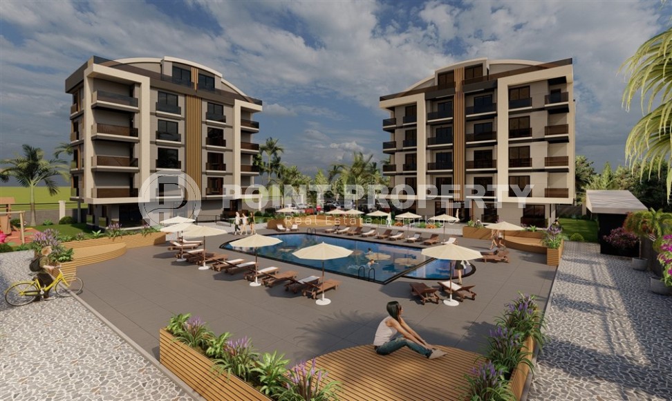 Апартаменты в жилом комплексе на этапе строительства в центре популярного района Анталии - Дешемалты-id-7367-фото-8