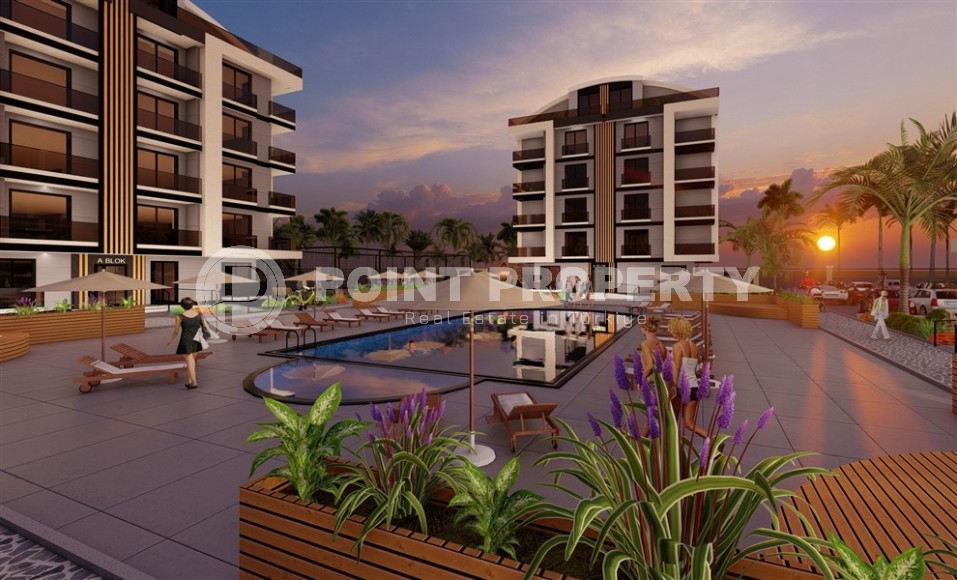 Апартаменты в жилом комплексе на этапе строительства в центре популярного района Анталии - Дешемалты-id-7367-фото-9