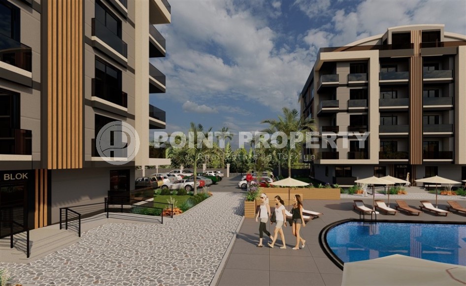 Апартаменты в жилом комплексе на этапе строительства в центре популярного района Анталии - Дешемалты-id-7367-фото-10