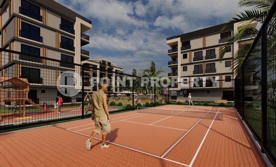 Апартаменты в жилом комплексе на этапе строительства в центре популярного района Анталии - Дешемалты-id-7367-фото-11