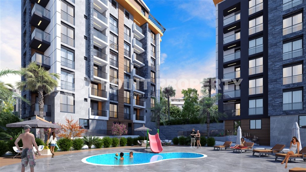 Linear and two-level apartments in a residential complex under construction 200 meters from the sea, in the resort town of Serik, in the province of Antalya-id-7368-photo-7