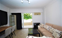 One bedroom apartment, 55m², in a complex with a swimming pool 100m from the sea in Oba, Alanya.-id-1571-photo-2