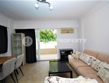 One bedroom apartment, 55m², in a complex with a swimming pool 100m from the sea in Oba, Alanya.-id-1571-photo-2