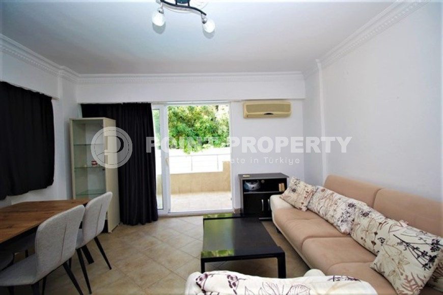 One bedroom apartment, 55m², in a complex with a swimming pool 100m from the sea in Oba, Alanya.-id-1571-photo-2