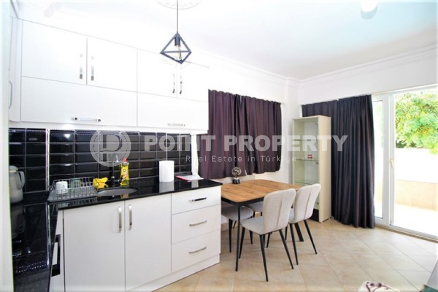 One bedroom apartment, 55m², in a complex with a swimming pool 100m from the sea in Oba, Alanya.-id-1571-photo-4