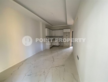 Небольшая новая квартира с чистовой отделкой в 350 метрах от моря, в центре спокойного района Аланьи - Тосмур-id-7383-фото-2