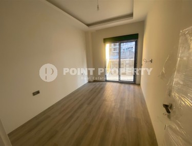 Небольшая новая квартира с чистовой отделкой в 350 метрах от моря, в центре спокойного района Аланьи - Тосмур-id-7383-фото-4