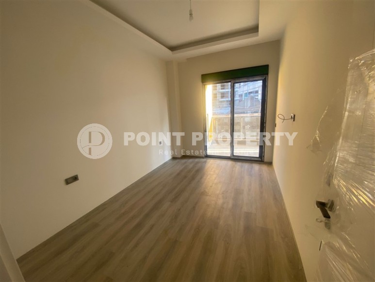 Небольшая новая квартира с чистовой отделкой в 350 метрах от моря, в центре спокойного района Аланьи - Тосмур-id-7383-фото-4