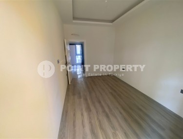 Небольшая новая квартира с чистовой отделкой в 350 метрах от моря, в центре спокойного района Аланьи - Тосмур-id-7383-фото-5