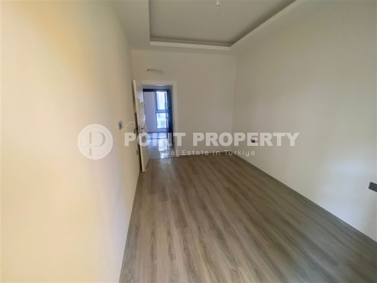 Небольшая новая квартира с чистовой отделкой в 350 метрах от моря, в центре спокойного района Аланьи - Тосмур-id-7383-фото-5