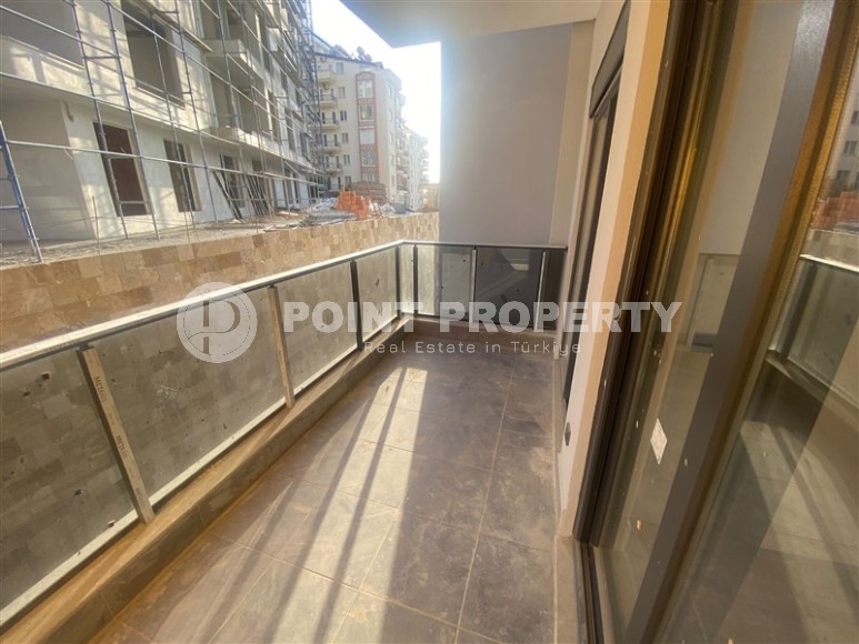 Небольшая новая квартира с чистовой отделкой в 350 метрах от моря, в центре спокойного района Аланьи - Тосмур-id-7383-фото-8