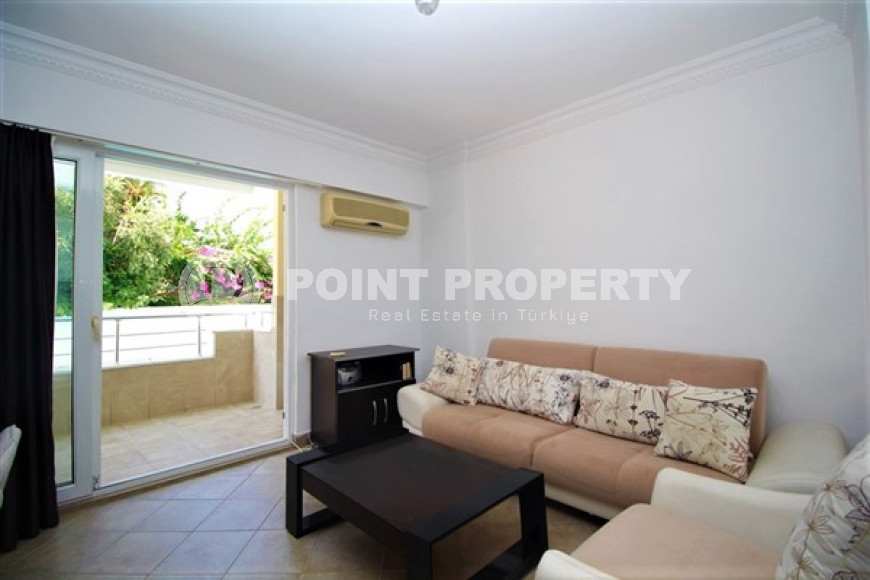 One bedroom apartment, 55m², in a complex with a swimming pool 100m from the sea in Oba, Alanya.-id-1571-photo-5