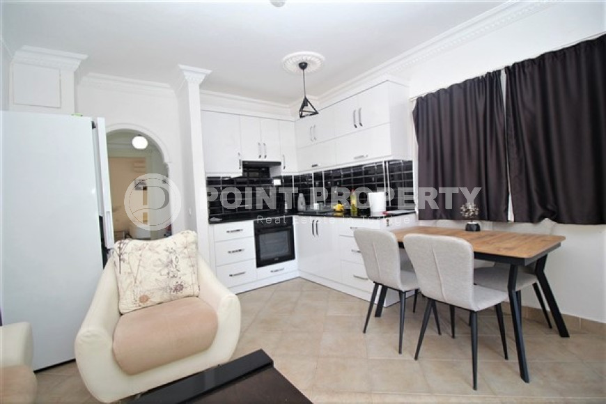 One bedroom apartment, 55m², in a complex with a swimming pool 100m from the sea in Oba, Alanya.-id-1571-photo-6