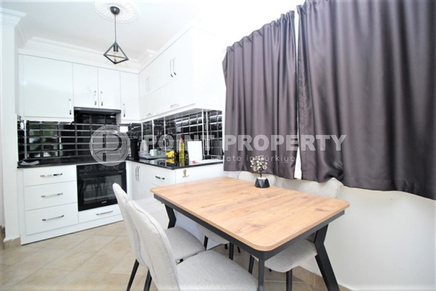 One bedroom apartment, 55m², in a complex with a swimming pool 100m from the sea in Oba, Alanya.-id-1571-photo-7