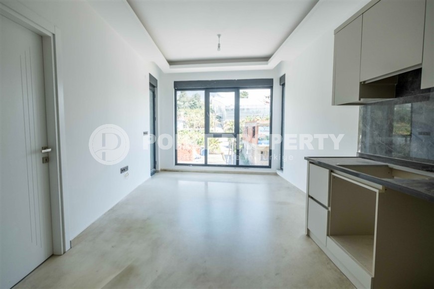 Светлая новая квартира в 700 метрах от моря, в современном районе Аланьи - Махмутлар-id-7385-фото-2