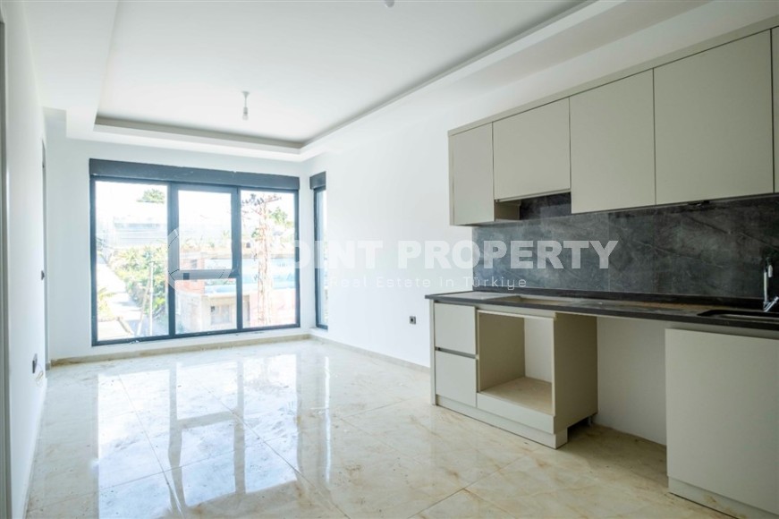 Светлая новая квартира в 700 метрах от моря, в современном районе Аланьи - Махмутлар-id-7385-фото-3