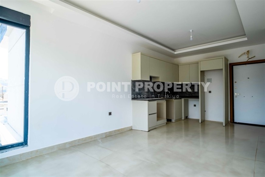 Светлая новая квартира в 700 метрах от моря, в современном районе Аланьи - Махмутлар-id-7385-фото-4