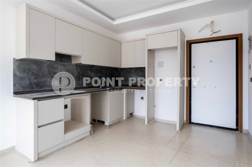 Светлая новая квартира в 700 метрах от моря, в современном районе Аланьи - Махмутлар-id-7385-фото-5