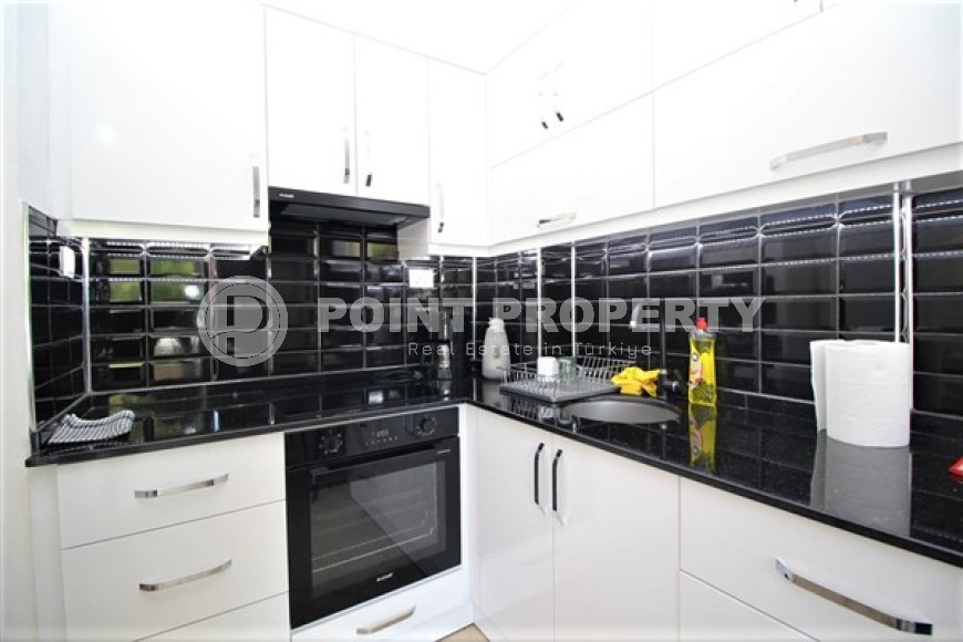 One bedroom apartment, 55m², in a complex with a swimming pool 100m from the sea in Oba, Alanya.-id-1571-photo-8