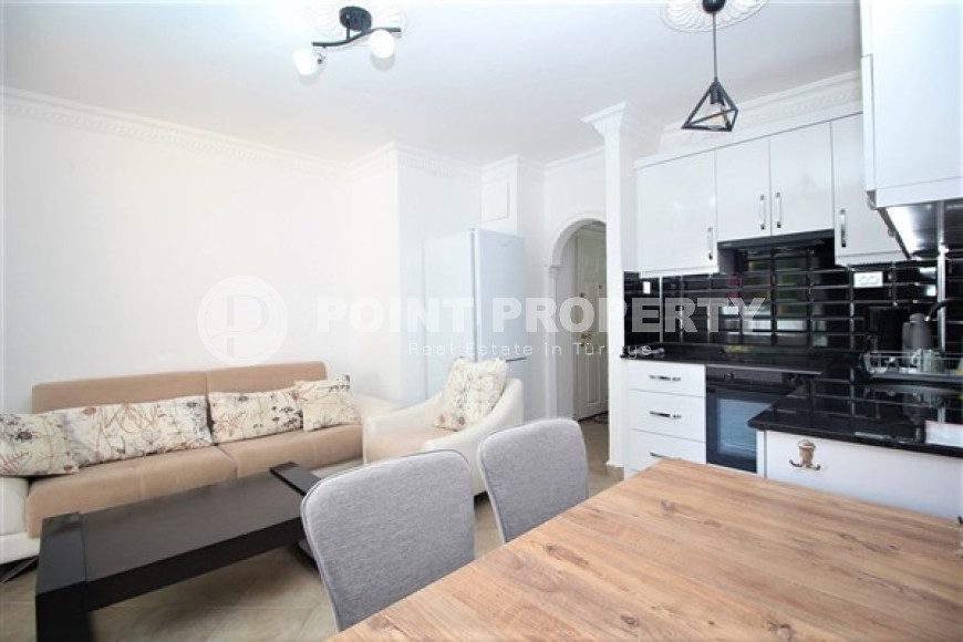 One bedroom apartment, 55m², in a complex with a swimming pool 100m from the sea in Oba, Alanya.-id-1571-photo-9