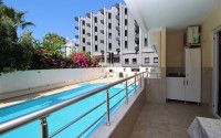 One bedroom apartment, 55m², in a complex with a swimming pool 100m from the sea in Oba, Alanya.-id-1571-photo-12