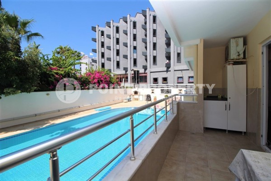 One bedroom apartment, 55m², in a complex with a swimming pool 100m from the sea in Oba, Alanya.-id-1571-photo-12
