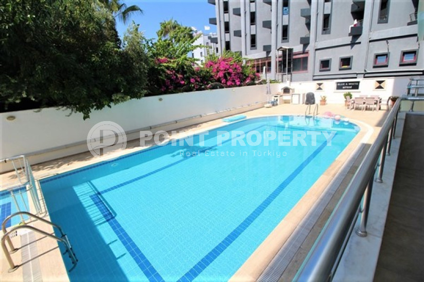 One bedroom apartment, 55m², in a complex with a swimming pool 100m from the sea in Oba, Alanya.-id-1571-photo-13