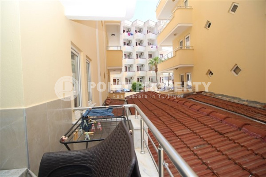 One bedroom apartment, 55m², in a complex with a swimming pool 100m from the sea in Oba, Alanya.-id-1571-photo-14