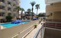 One bedroom apartment, 55m², in a complex with a swimming pool 100m from the sea in Oba, Alanya.-id-1571-photo-18