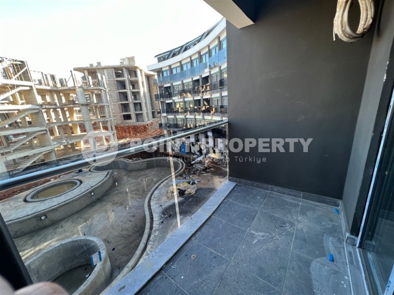 Квартира на 2-м этаже в жилом комплексе на этапе строительства, в перспективном районе Аланьи - Верхняя Оба-id-7392-фото-8