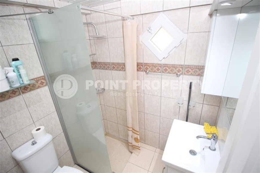 One bedroom apartment, 55m², in a complex with a swimming pool 100m from the sea in Oba, Alanya.-id-1571-photo-19