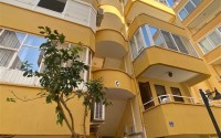 Inexpensive apartment 150 meters from the sea, on the main street of the Mahmutlar district-id-7394-photo-1