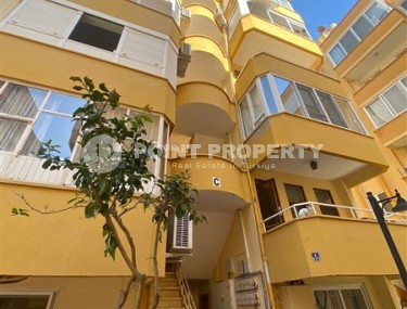 Inexpensive apartment 150 meters from the sea, on the main street of the Mahmutlar district-id-7394-photo-1