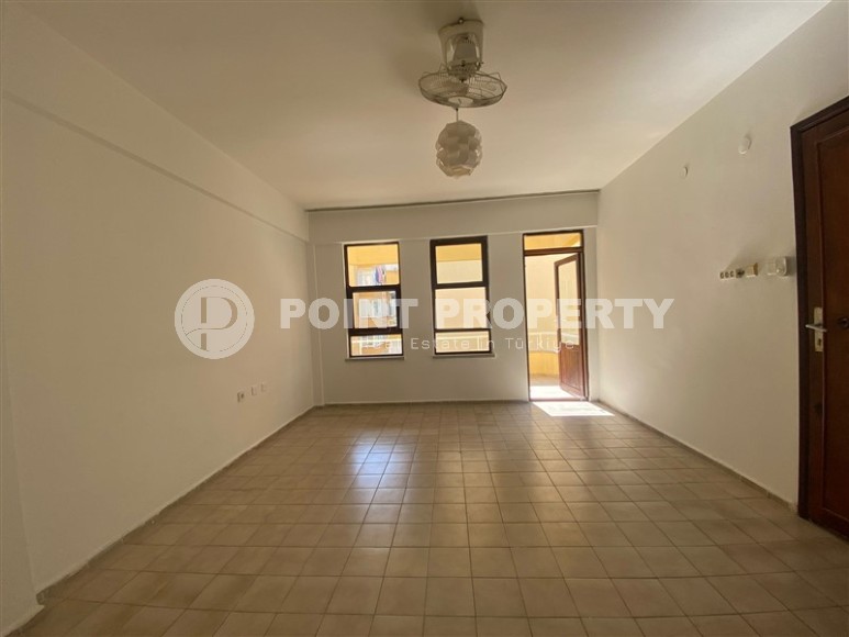 Inexpensive apartment 150 meters from the sea, on the main street of the Mahmutlar district-id-7394-photo-4