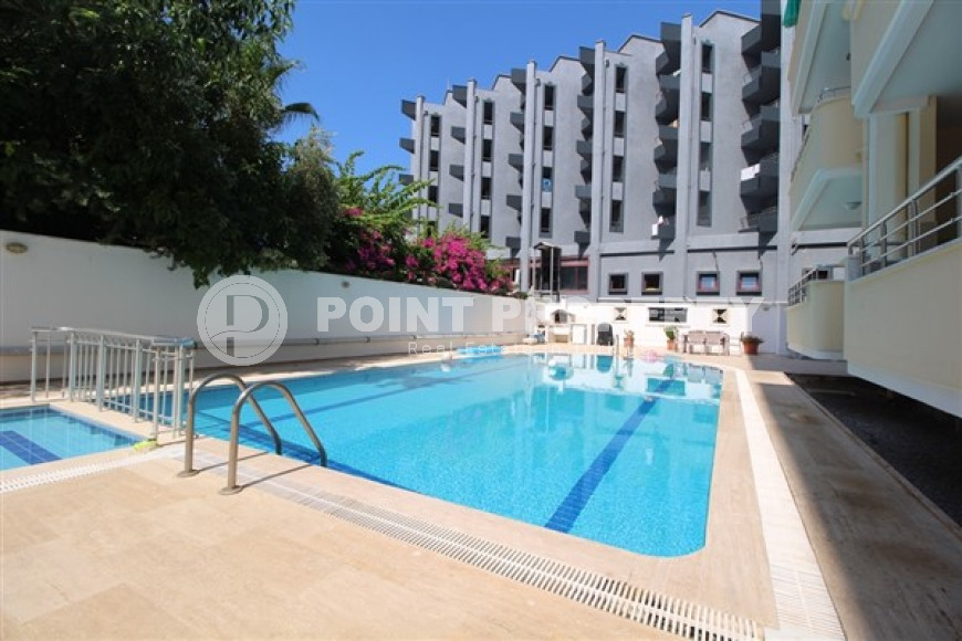 One bedroom apartment, 55m², in a complex with a swimming pool 100m from the sea in Oba, Alanya.-id-1571-photo-22