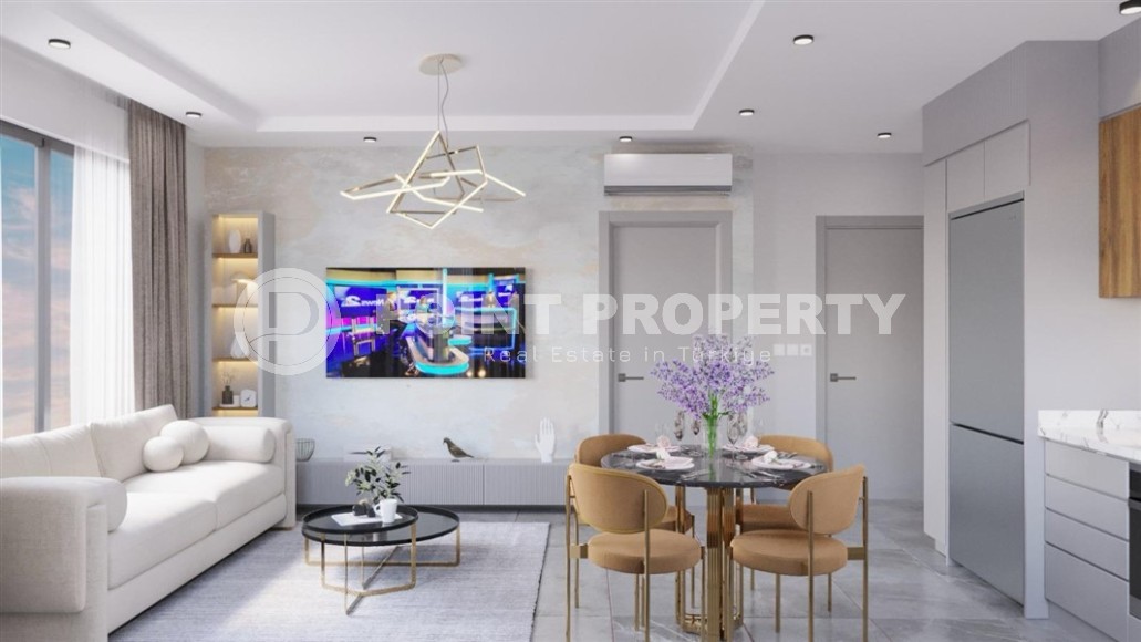 Two 2+1 apartments in a residential complex under construction, in the center of the popular Mediterranean resort - Alanya-id-7395-photo-2