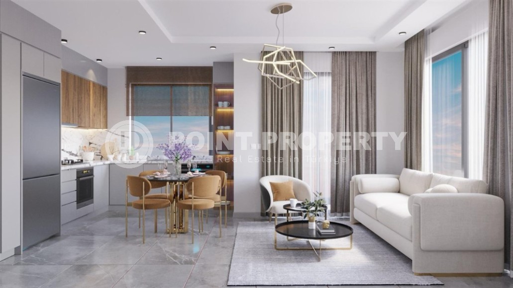 Two 2+1 apartments in a residential complex under construction, in the center of the popular Mediterranean resort - Alanya-id-7395-photo-3