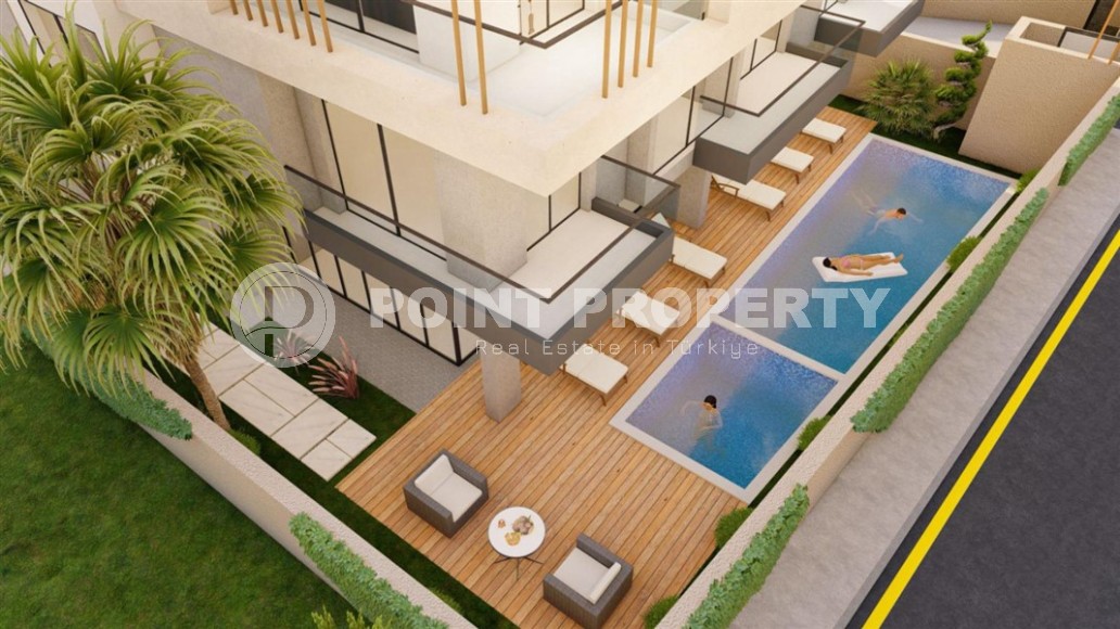 Two 2+1 apartments in a residential complex under construction, in the center of the popular Mediterranean resort - Alanya-id-7395-photo-9