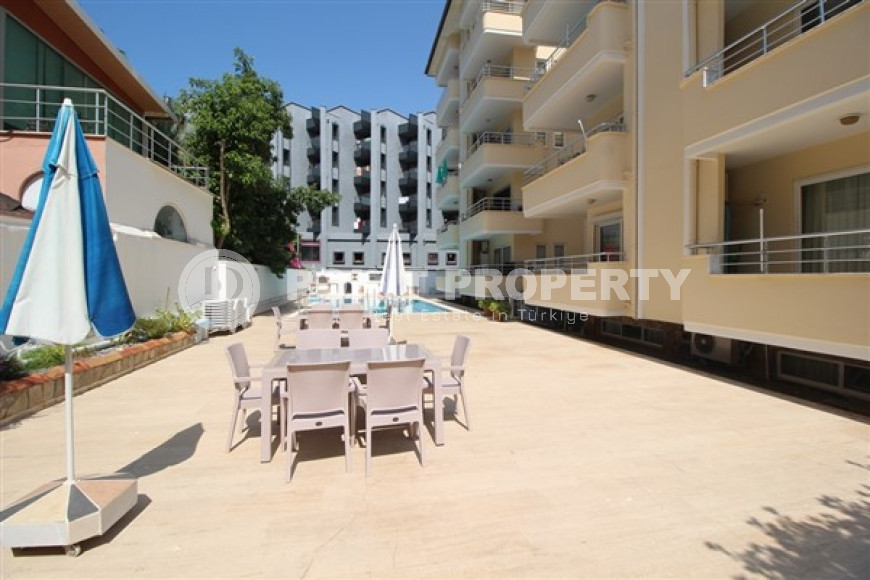 One bedroom apartment, 55m², in a complex with a swimming pool 100m from the sea in Oba, Alanya.-id-1571-photo-24
